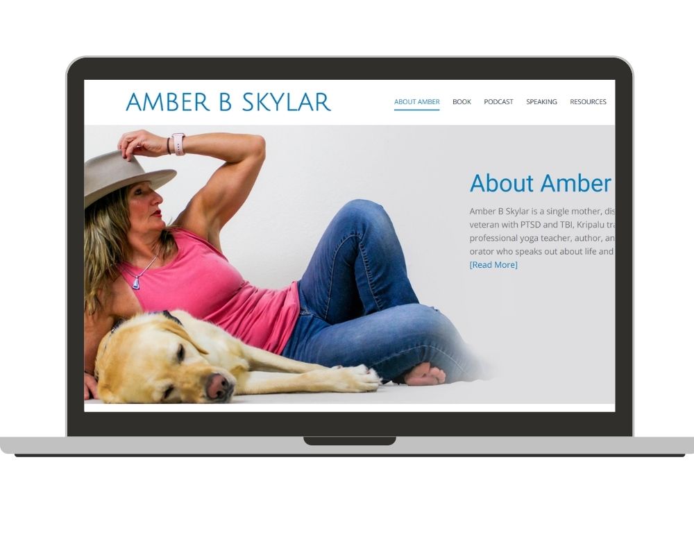 Amber B Skylar website on laptop